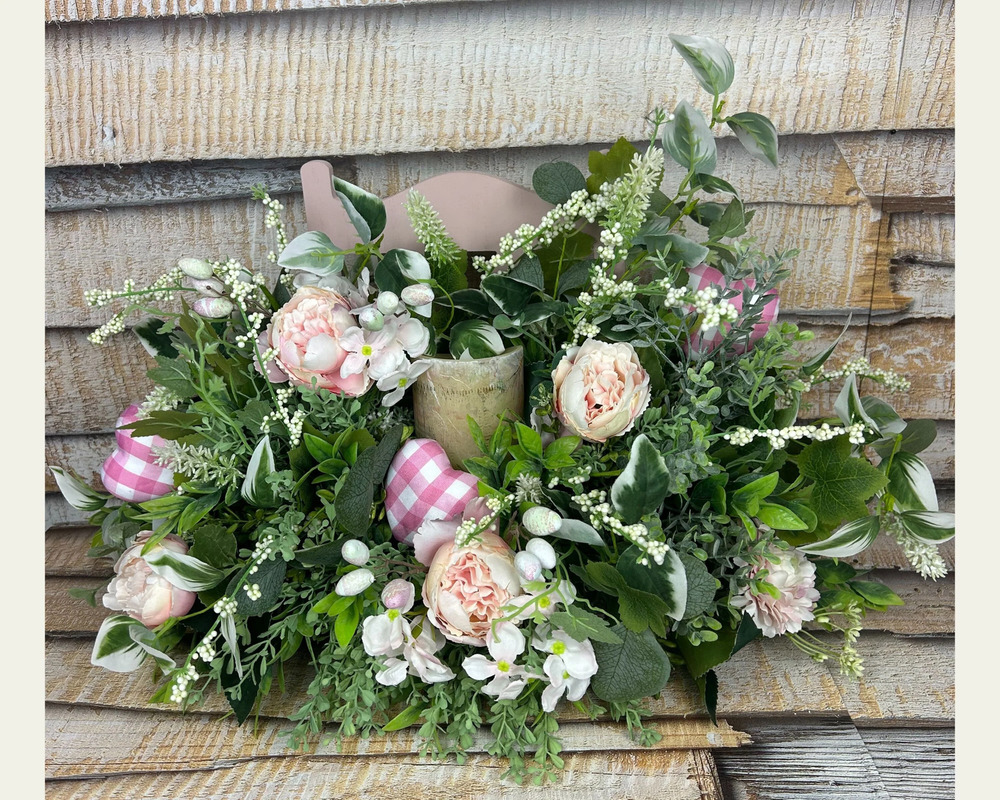 Floral farmhouse decoration with candle, pink floral centerpiece, shabby floral